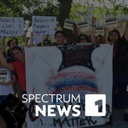 Small Group of Protesters Taken Aback By Preparations Downtown